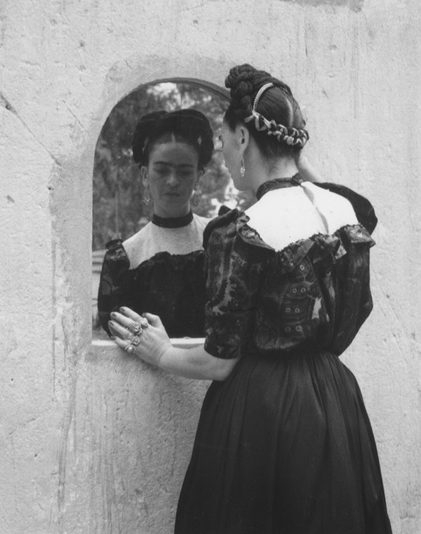 1944, Frida Looking Into Mirror. by Lola Alvarez Bravo